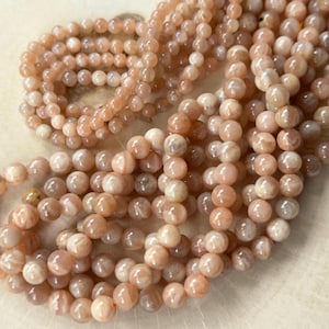Moonstone beads peach colored 6 mm strand