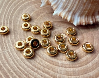 Esferas espaçadoras, esferas de distância, latão dourado de 4/5 mm
