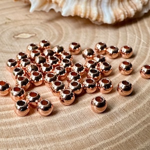 Spacer beads, brass rose gold 50 pieces