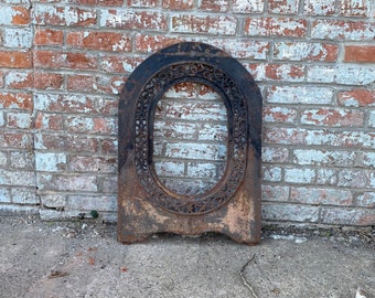 Antique Architectural Salvage cast iron Fireplace arched insert.