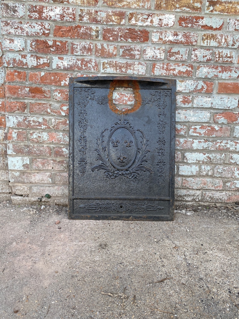 Antique Architectural Salvage cast iron Fireplace Cover. image 1