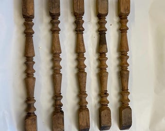 Set of 5  antique oak balusters, which are architectural salvage items.