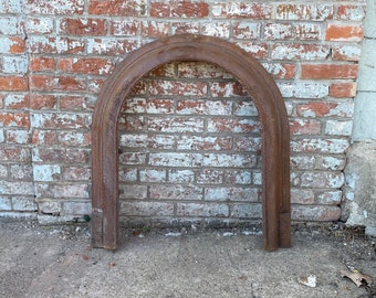 Antique Architectural Salvage cast iron fireplace surround.