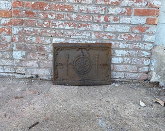 Antique Architectural Salvage cast iron fireplace cover.