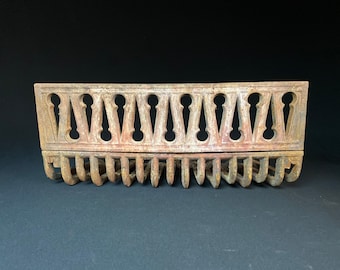 Antique architectural, salvage, cast iron fireplace grate and log holder.