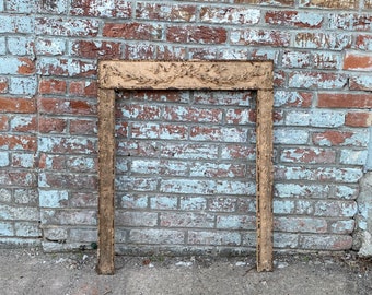 Antique Architectural Salvage cast iron fireplace surround.