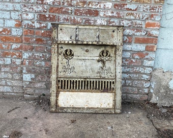 Antique Architectural Salvage cast iron fireplace grill, complete.