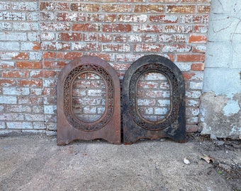 Antique Architectural Salvage cast iron Fireplace arched inserts, matched pair.