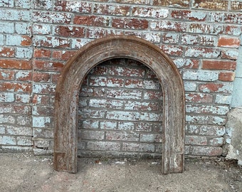 Antique Architectural Salvage cast iron fireplace surround.