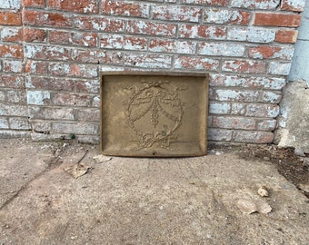 Antique Architectural Salvage cast iron fireplace cover.