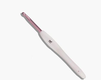 crochet hook to button wedding dress Button + Bustle Hook