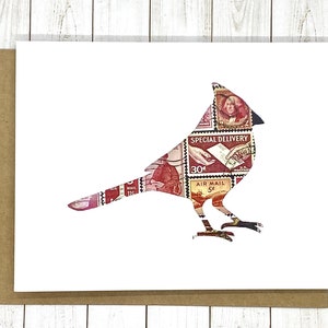 May include: A red cardinal silhouette made from vintage postage stamps. The bird is facing right and has a long tail. The stamps feature images of people, airplanes, and the words "Special Delivery" and "Air Mail".