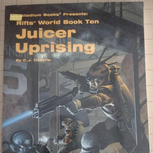 May include: Cover art for "Rifts World Book Ten: Juicer Uprising" by C.J. Carella. The illustration depicts futuristic soldiers in combat, with one aiming a weapon that emits a blue beam. The book cover features the title in large, orange letters.