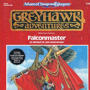 May include: A red and gold Greyhawk Adventures game cover with the title "Falconmaster" and the text "Official Game Adventure" and "by Richard W. and Anne Brown". The cover features a red flag with a gold eagle and a gold castle with a blue banner.