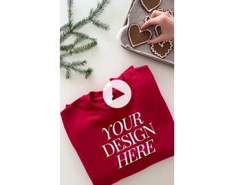 May include: Red sweatshirt with the text "YOUR DESIGN HERE" printed in white on the front.