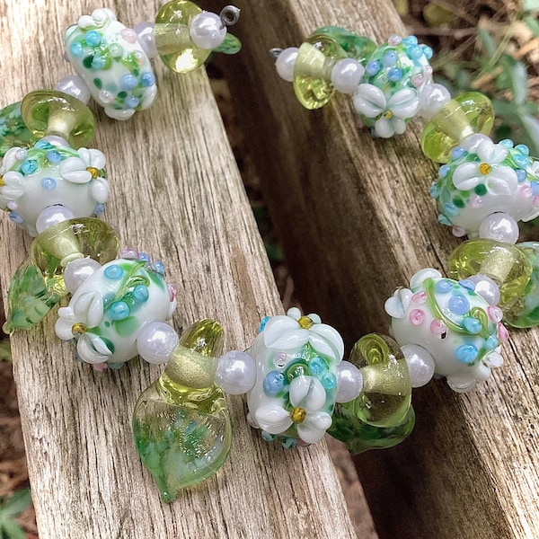 Destash ONE handmade SRA Lampwork glass bead, blue white flowers, donut spacer, diy jewelry design, rustic boho, OOAK unique artisan beads