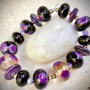 Destash SET (16) Handmade lampwork glass beads, black purple donuts, artisan SRA Lampwork, DIY jewelry design supplies.