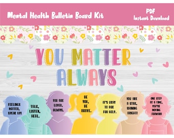 Op de afbeelding: Een printbare bulletin board-set voor bewustwording van geestelijke gezondheid. De set bevat een kleurrijk banner met de tekst "You Matter Always" en zes kleurrijke karakter-uitsnijdingen met positieve affirmaties. De affirmaties omvatten "Feelings Matter, Speak Up!" "Talk, Listen, Heal." "You Are Loved, Always." "Be You, Be Brave." "It's Okay To Ask For Help." "You Are A Star, Shining Bright!" "One Step At A Time, You're Moving Forward."