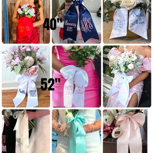 May include: A collage of images featuring satin ribbons, some with floral arrangements. The ribbons are in various colors, including red, navy, white, and light pink. Some ribbons have text like "Homecoming 2025" or initials embroidered on them. The longest ribbon is 64 inches.