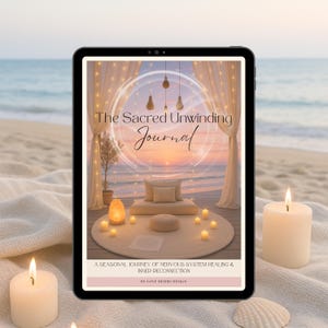 May include: A digital tablet shows a journal cover titled "The Sacred Unwinding Journal." The image depicts a tranquil setting with candles, cushions, and a beach background. The text reads "A Seasonal Journey of Nervous System Healing & Inner Reconnection."