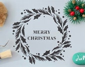 Christmas holly wreath stencil. With Merry Christmas greeting for card making, fabric painting, cake decorating, glass etching, crafts.