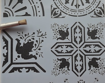 May include: A stencil sheet with six different designs for creating tile patterns. The designs include a circular pattern, a floral pattern, and a geometric pattern. The stencil sheet is made of a clear plastic material and is reusable.