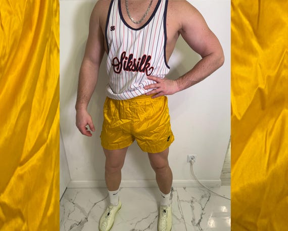 nike nylon shorts yellow