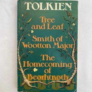 May include: A green book cover with the title "Tree and Leaf" by J.R.R. Tolkien. The book is part of the "Smith of Wootton Major" series and features a detailed illustration of a tree with intricate branches and leaves.