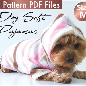 May include: A brown and white striped dog pajama with a pink hooded top. The pajamas are made of soft fleece and are designed for small dogs. The size is M.