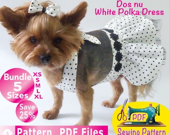 May include: A small dog wearing a white polka dot dress with a matching bow. The dress has black floral accents and is paired with a matching bow. The image includes text that says "Dos nu White Polka Dress", "Bundle 5 Sizes", and "Save 25%."