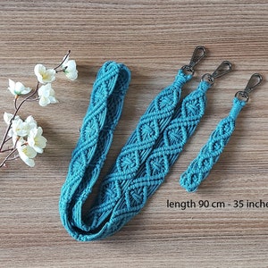 May include: Teal blue macrame strap with silver clasps. The strap is 35 inches long and has a diamond pattern.  length 90 cm - 35 inches