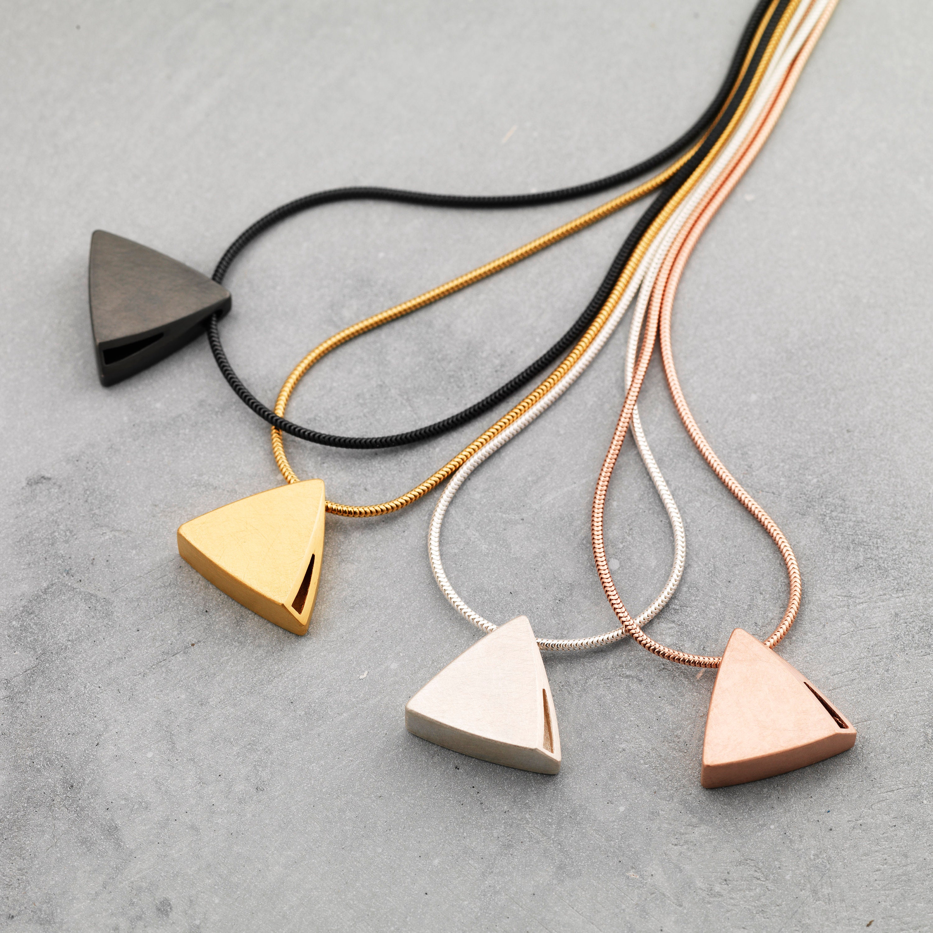 Curved Curves Triangle Pendant
