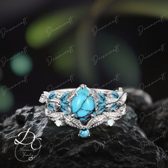 Pear Shaped Diamond Engagement Rings With Turquoise Accents Gothic - Main Image