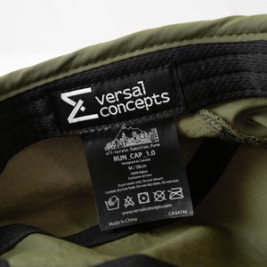 army green cap hat travel hiking commuting running walking techwear gorpcore streetwear water resistant dwr stretchy versal concepts  label reflective breathable buckle adjustable soft foldable moisture wicking