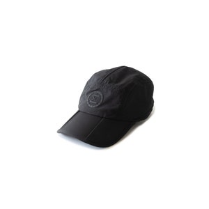 black cap hat travel hiking commuting running walking techwear gorpcore streetwear water resistant dwr stretchy versal concepts  front quarter reflective breathable buckle adjustable soft foldable