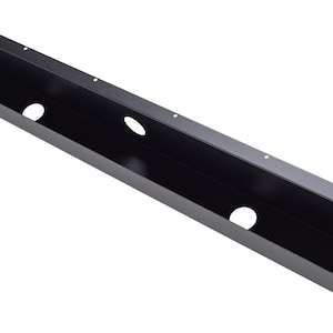 May include: Black metal cable management channel with multiple holes for wire routing. The channel is designed to be mounted on a wall or ceiling.