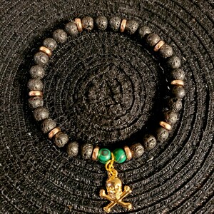 Lava Bead Skull Charm Bracelet