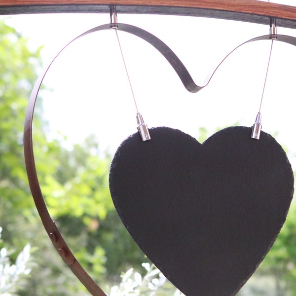 Unique hand bent heart made from reclaimed wine/whiskey barrel bands and staves with custom engraved slate heart.