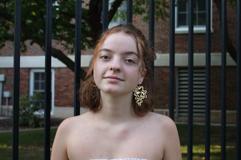 Gold Curly Hair Female Face Earrings