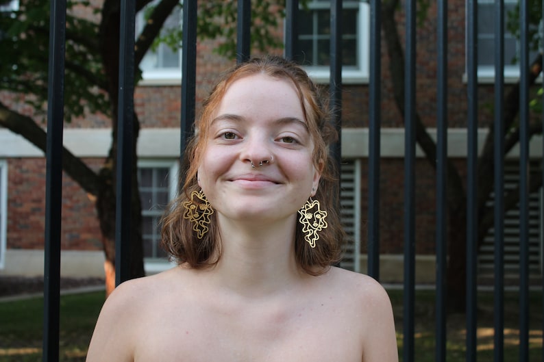 Gold Curly Hair Female Face Earrings