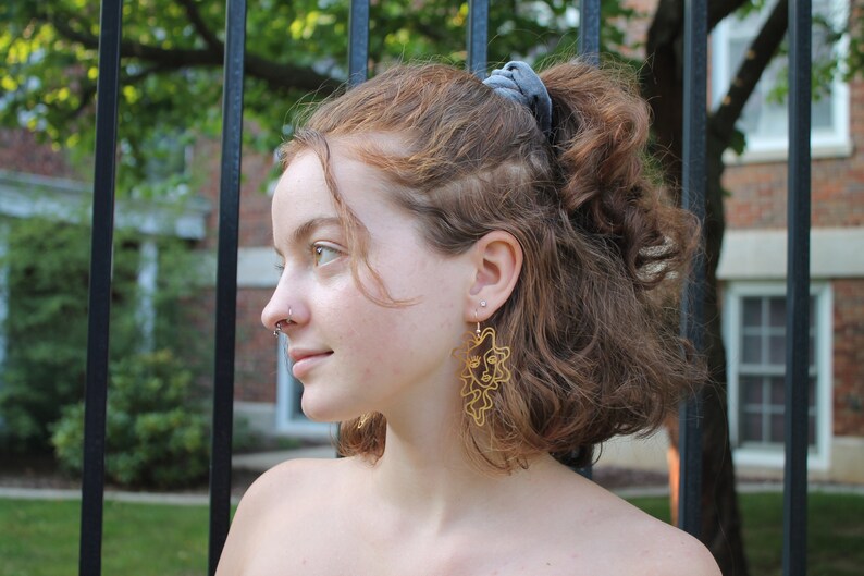 Gold Curly Hair Female Face Earrings