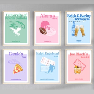 May include: Six colourful illustrated posters with white borders. Each poster features a different local business or organisation in Grand Forks, North Dakota. The posters include: University of North Dakota, Alerus Centre, Brick & Barley Bar & Restaurant, Deek's Pizza, Ralph Engelstad Arena, and Joe Black's Bar & Grill.