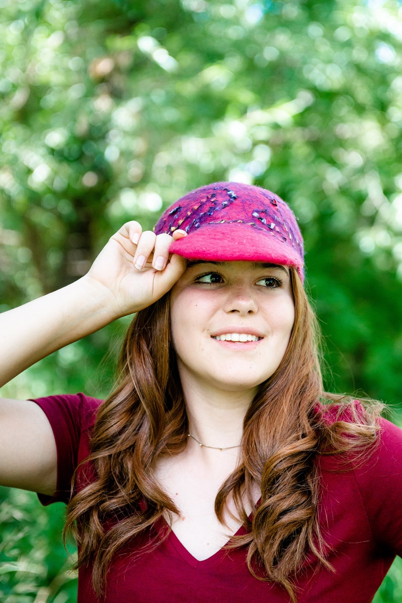 Red cap with multi-colored detail