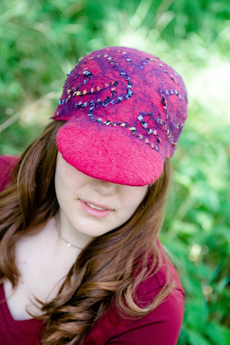 Red cap with multi-colored detail
