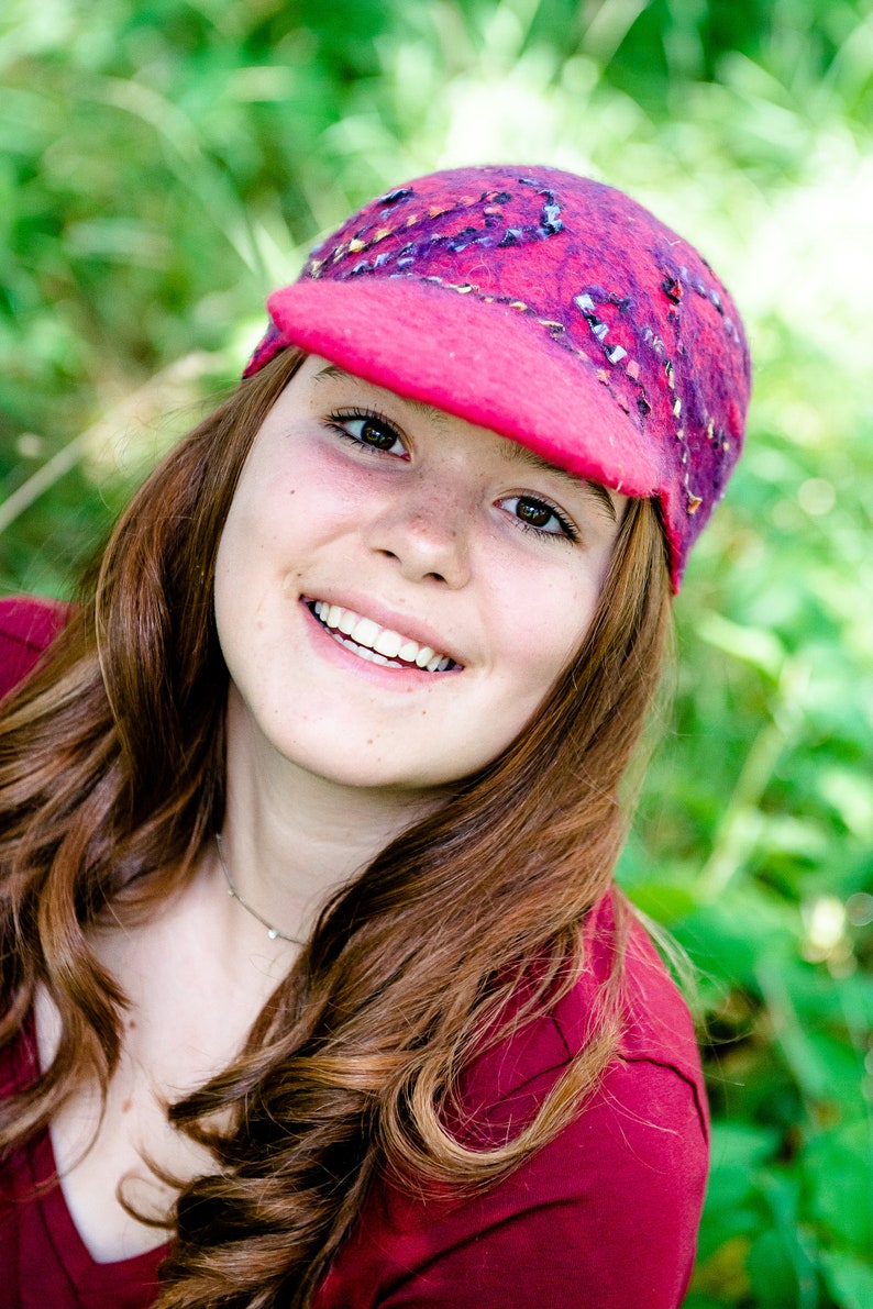 Red cap with multi-colored detail