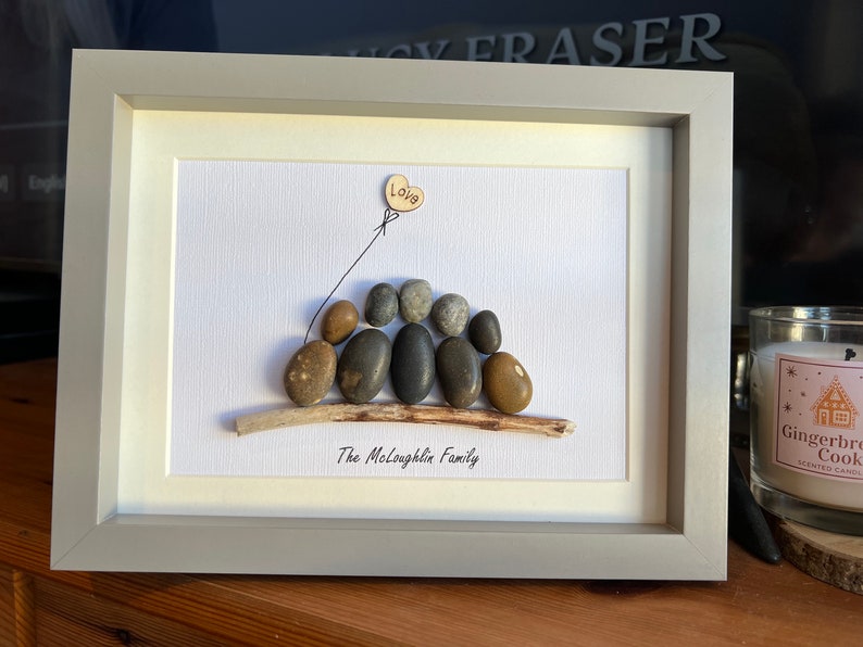 Family pebble art portrait image 9