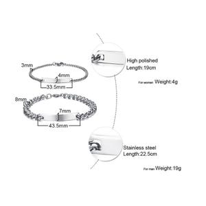 May include: Two silver-toned stainless steel chain bracelets with rectangular identification plates. The top bracelet is 19cm long, 3mm wide, and 4g. The bottom bracelet is 22.5cm long, 8mm wide, and 19g. Both feature high-polished surfaces and links.