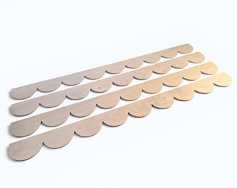 Moldura festoneada de álamo de 42 pulgadas de largo y 1/4 de pulgada de grosor.