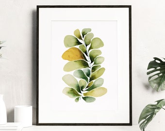 May include: A framed watercolor painting of a stylized green and yellow plant with a white background.