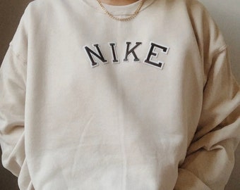 ثورة خندق شمالي nike crewneck 